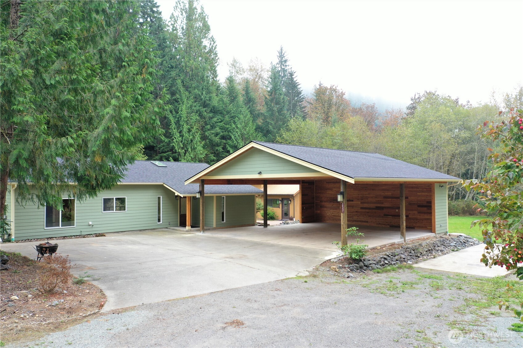 30331 Heimer Road Arlington, WA 98223 - Photo 15 of 37 a house with trees in the background