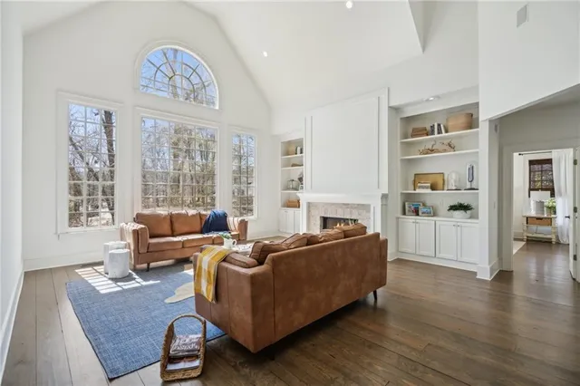 a living room with furniture and a rug