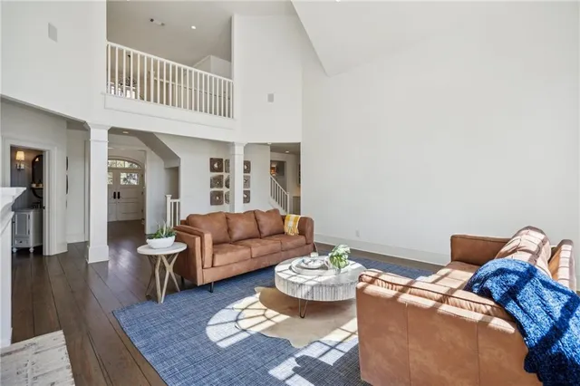 a kitchen with stainless steel appliances granite countertop a sink and cabinets