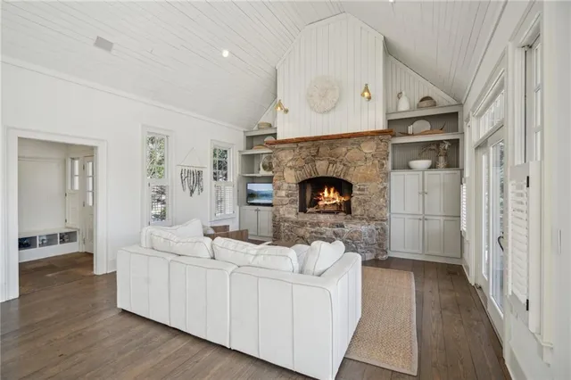 a bedroom with bed and a window