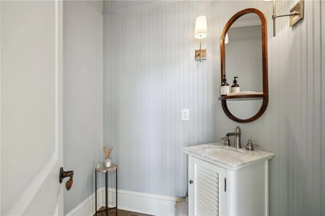 a bathroom with a bathtub and shower