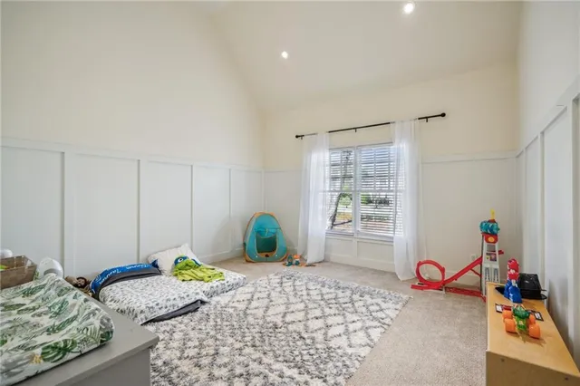 a en suite bathroom with a sink double vanity and a mirror