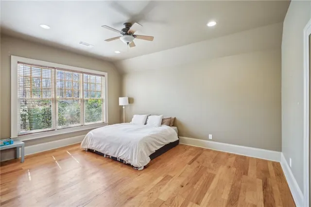 a view of backyard with large trees