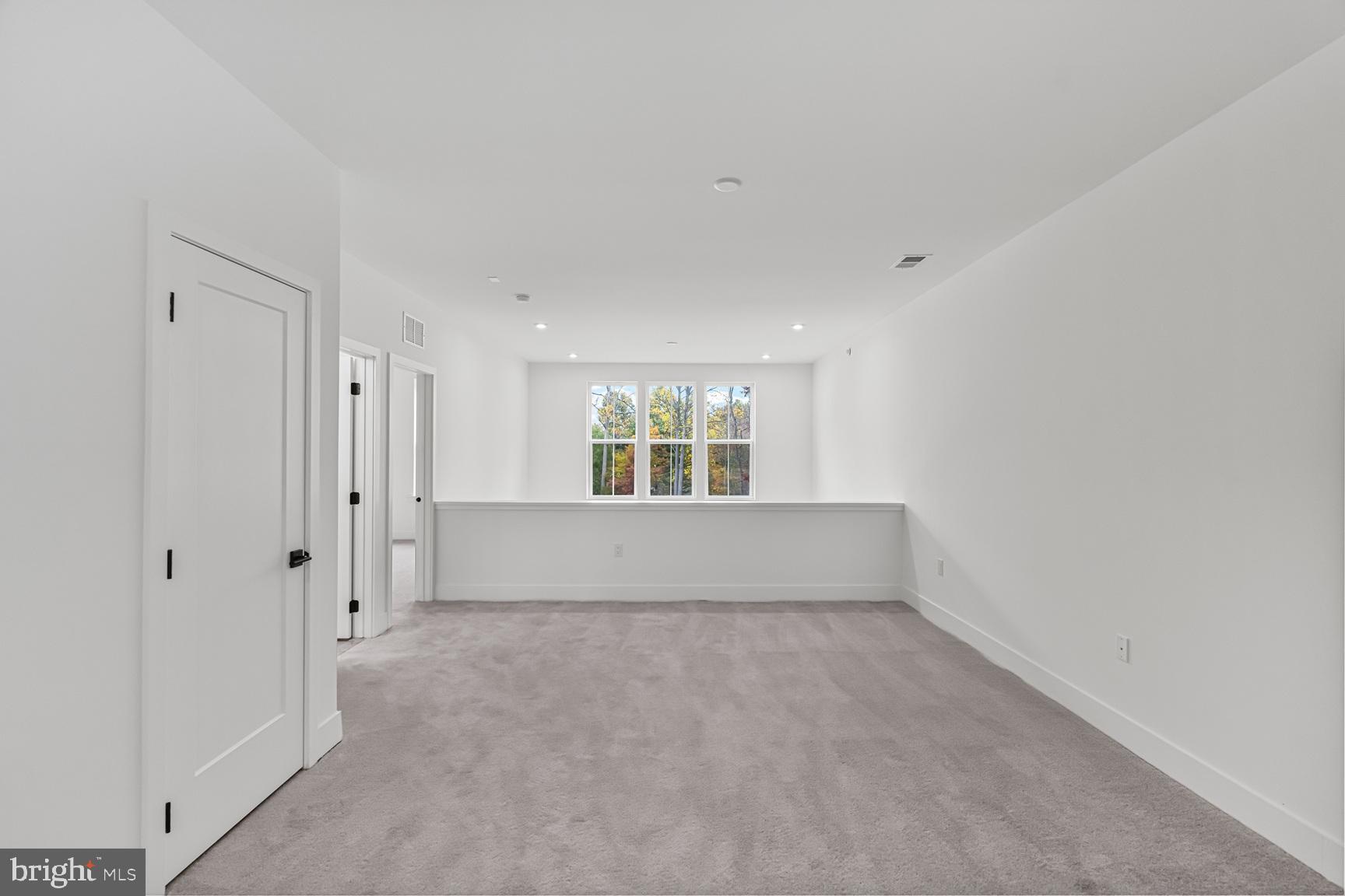 10206 Donatello Drive Princeton, NJ 08540 - Photo 18 of 30 a view of an empty room with a window