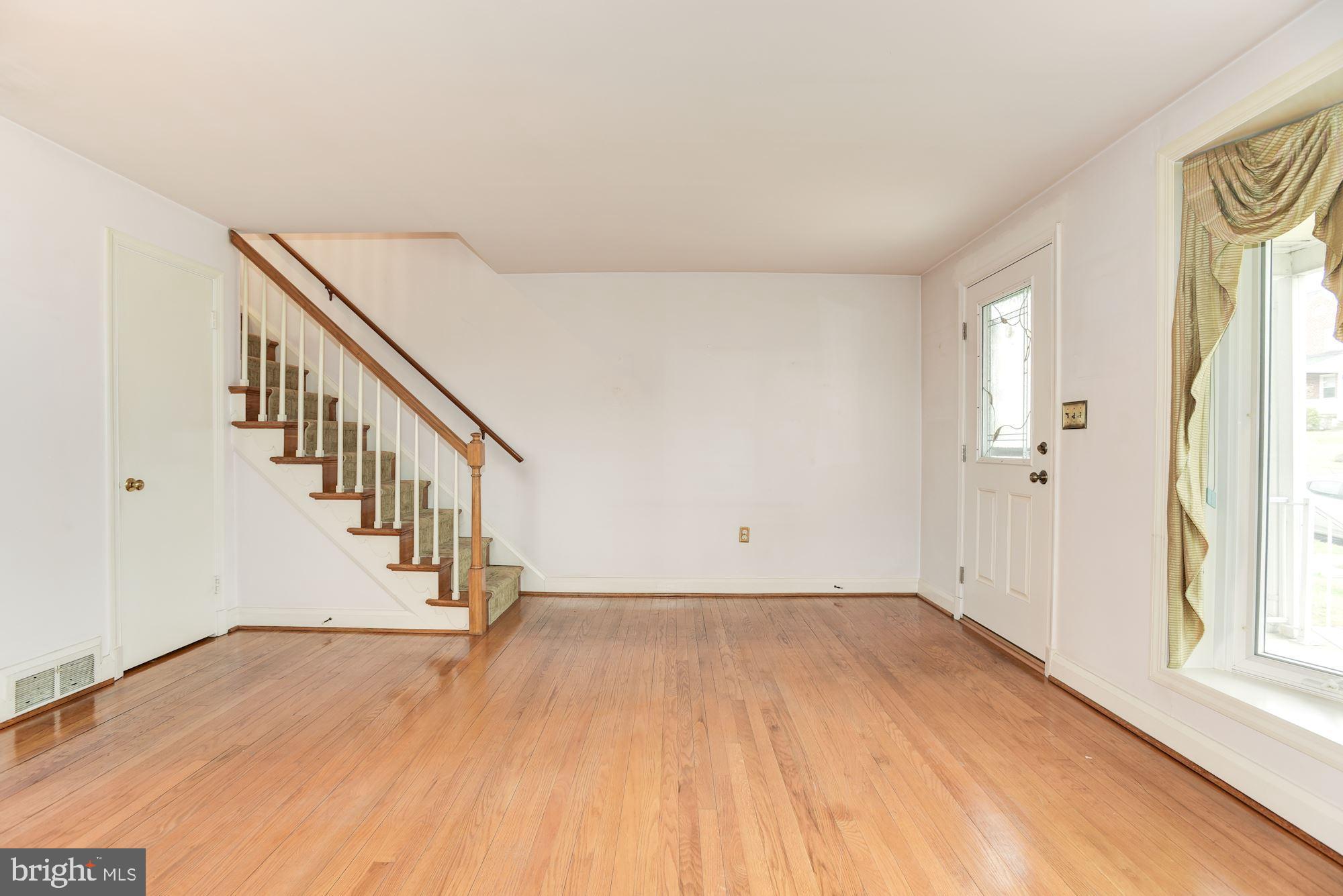 1041 Downton Road Baltimore, MD 21227 - Photo 6 of 40 Hardwood floors on. main level & upper level