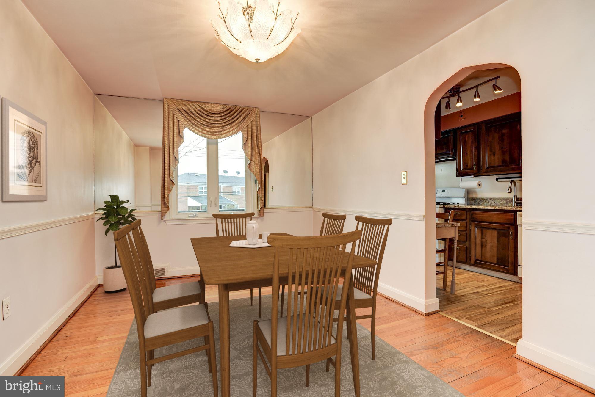 1041 Downton Road Baltimore, MD 21227 - Photo 10 of 40 Dining room with casement windows