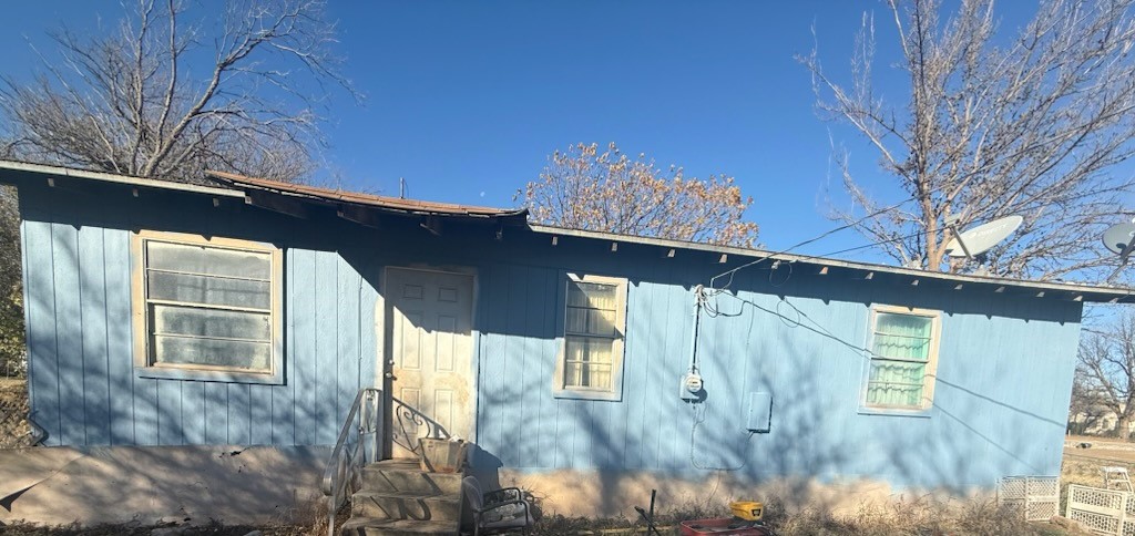 901 Rose Street Merkel, TX 79536 - Photo 2 of 10 a side view of a house with a yard