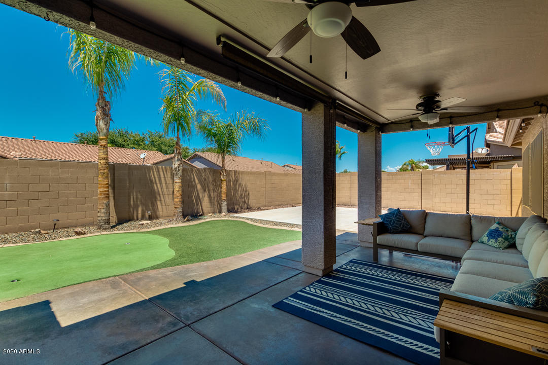 3788 South Martingale Road Gilbert, AZ 85297 - Photo 34 of 46 a outdoor living space with furniture