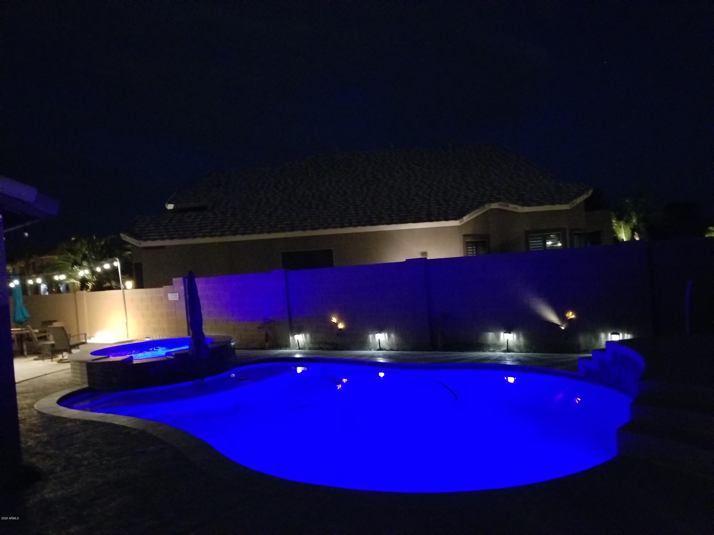 3788 South Martingale Road Gilbert, AZ 85297 - Photo 44 of 46 a view of swimming pool with outdoor seating
