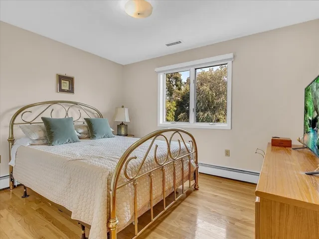 a front view of house with deck and outdoor seating