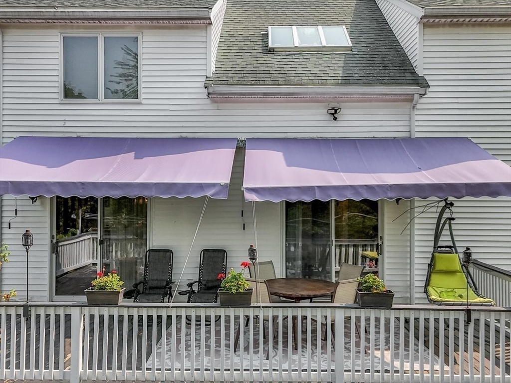 51 Walnut Street Saugus, MA 01906 - Photo 25 of 42 a couple of table and chairs in front of house
