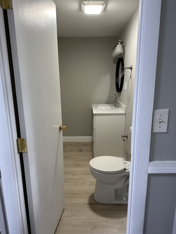 51 Walnut Street Saugus, MA 01906 - Photo 29 of 42 a bathroom with a toilet and a sink