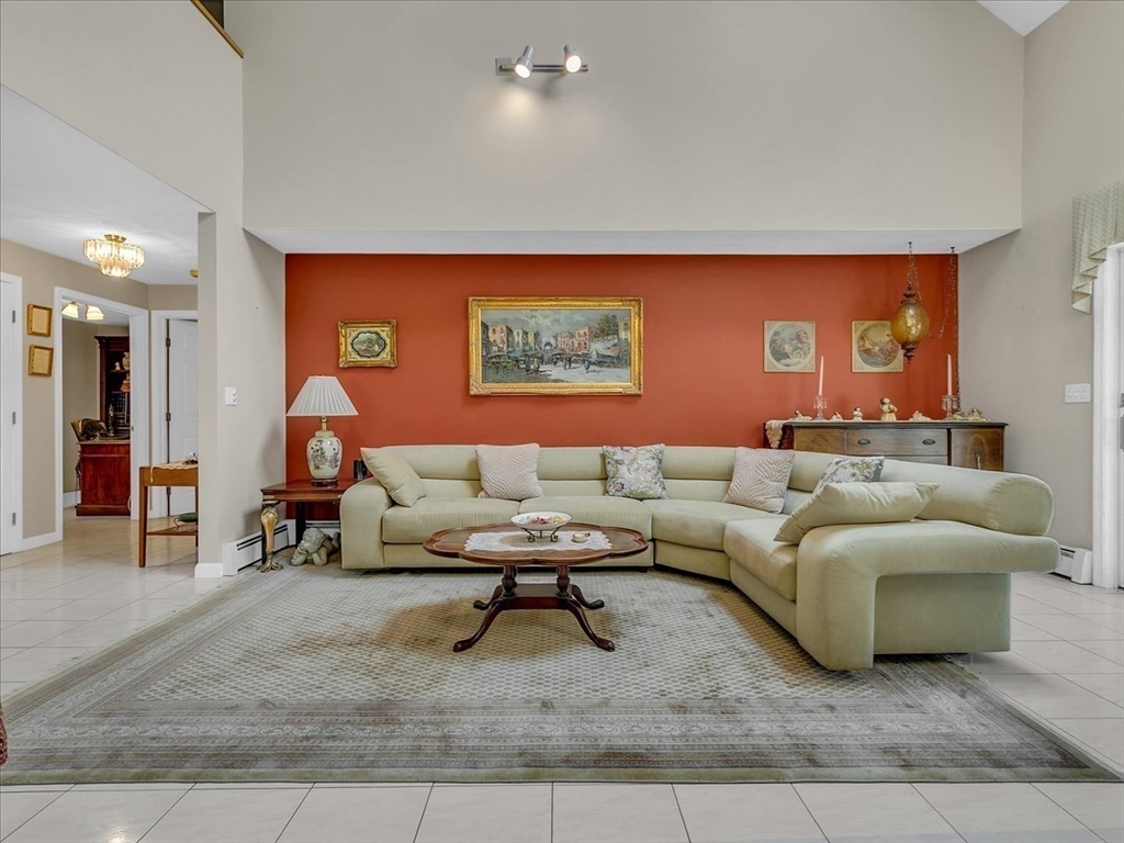 51 Walnut Street Saugus, MA 01906 - Photo 3 of 42 a living room with furniture and a rug
