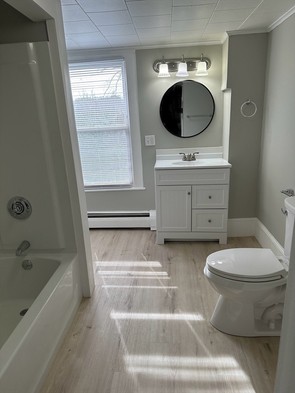 51 Walnut Street Saugus, MA 01906 - Photo 31 of 42 a bathroom with a sink toilet and bathtub