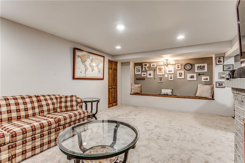3401 McRoberts Road Pittsburgh, PA 15234 - Photo 16 of 21 This adorable basement has been recently remodeled with a bench seat, new carpet, fireplace and plenty of room for fun and relaxation.