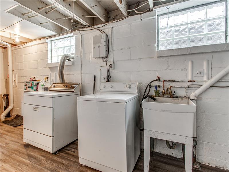 3401 McRoberts Road Pittsburgh, PA 15234 - Photo 19 of 21 Big laundry room with wood floors.