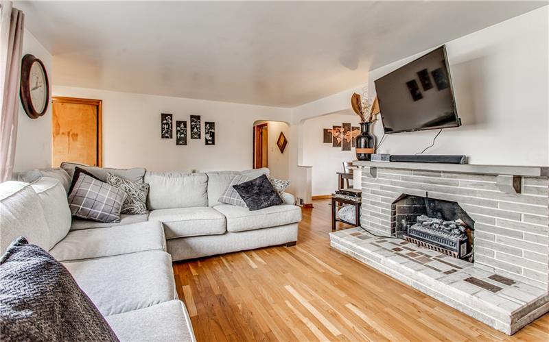 3401 McRoberts Road Pittsburgh, PA 15234 - Photo 5 of 21 This living room is everything you could want. Hard wood floors. Beautiful log burning fire place. Huge window. Large entry space with coat closet. Enjoy!