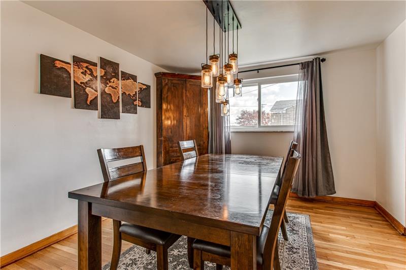 3401 McRoberts Road Pittsburgh, PA 15234 - Photo 8 of 21 Large dining room with closet and large window.