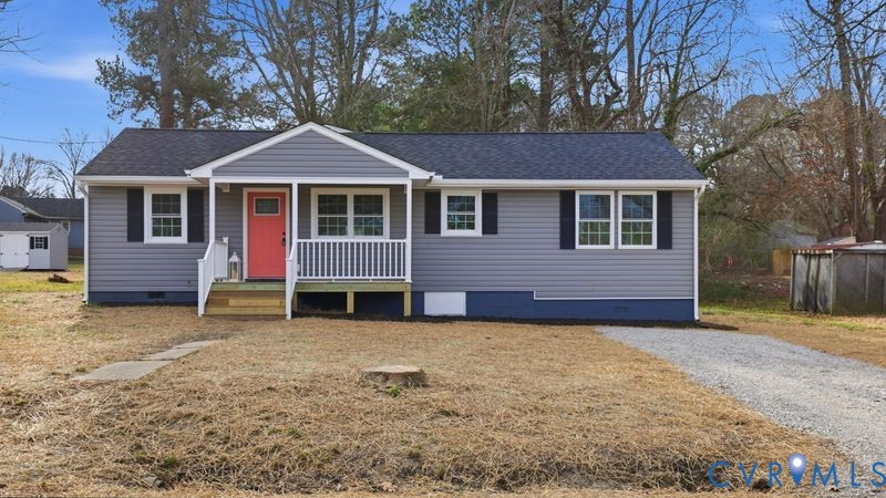 25209 Ritchie Avenue Petersburg, VA 23803 - Photo 2 of 50 a front view of a house with a yard