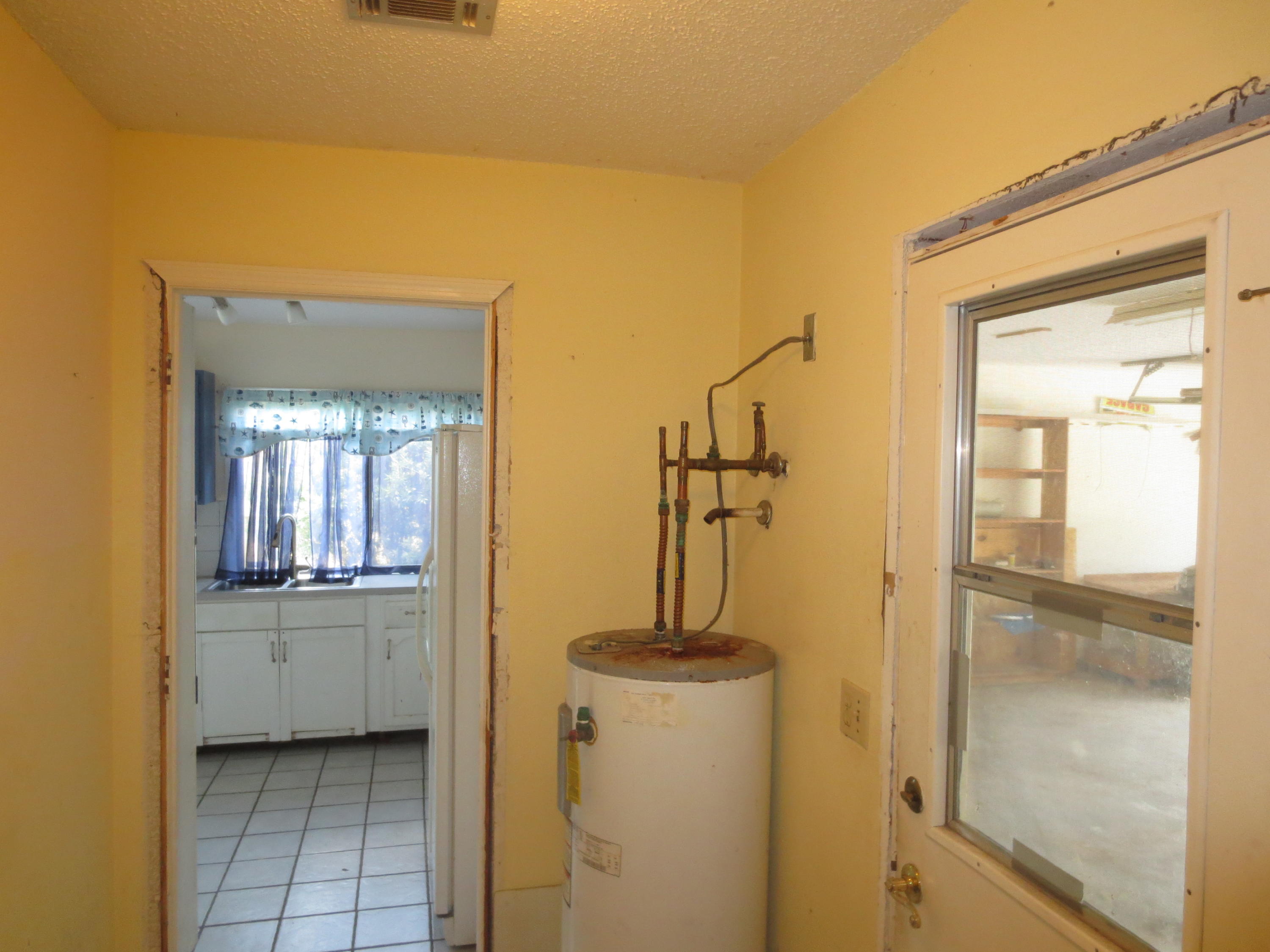 1861 Southeast Greendon Road Port St. Lucie, FL 34952 - Photo 22 of 29 Utility room