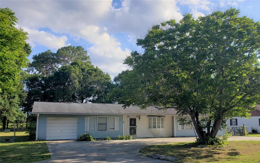 2990 Southwest 98th Street Road Ocala, FL 34476 - Photo 1 of 1 Front of home with 1 car garage