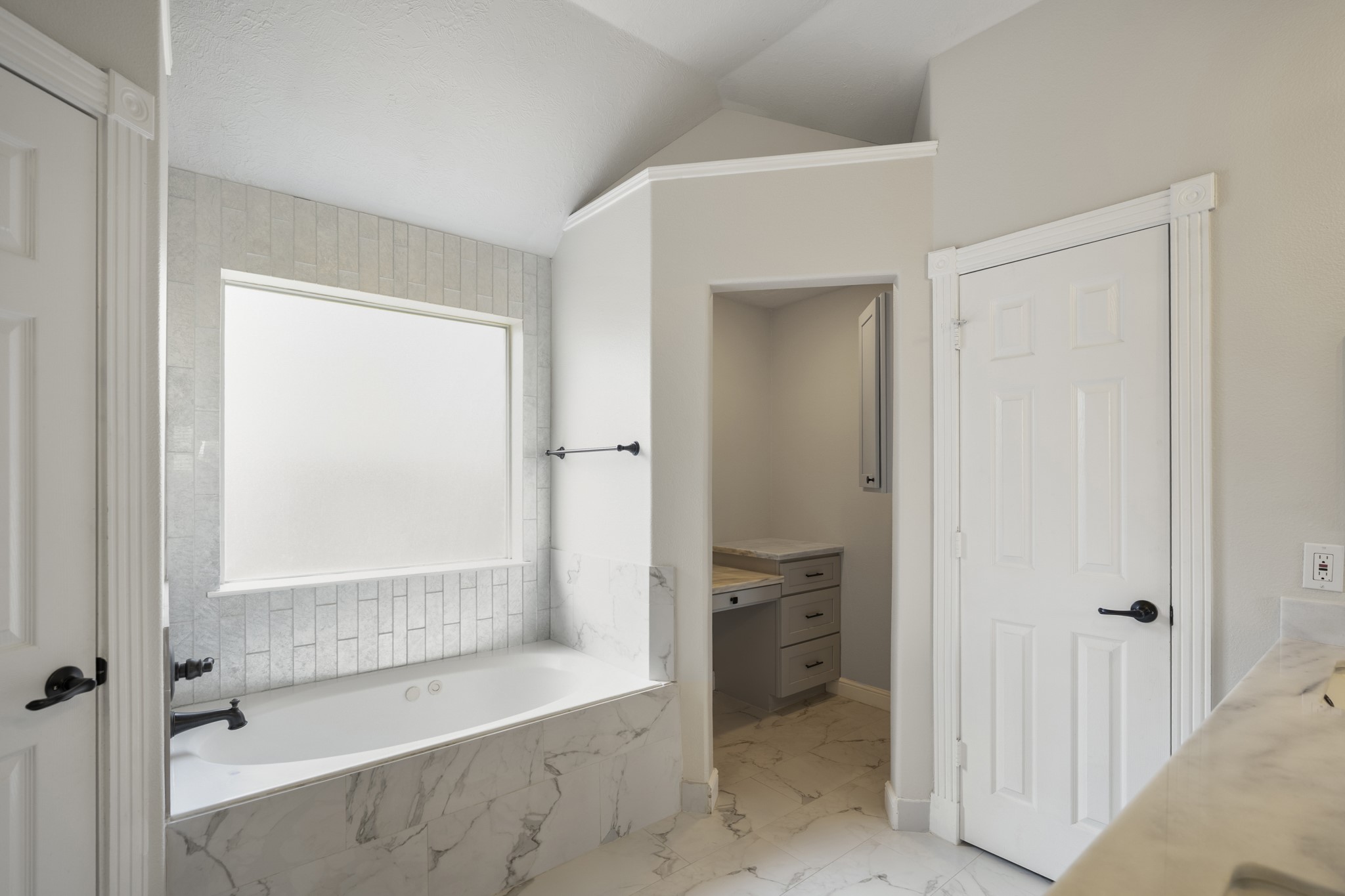 5802 Sawyer Bend Lane Spring, TX 77379 - Photo 20 of 50 a bathroom with a bathtub and a shower