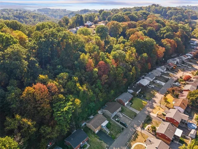 an aerial view of residential house with outdoor space