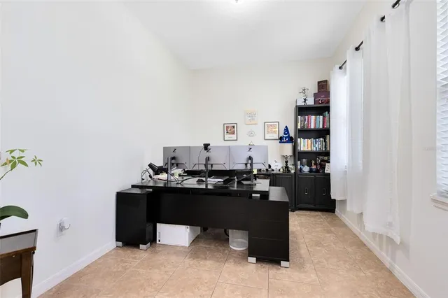 a view of a workspace with furniture