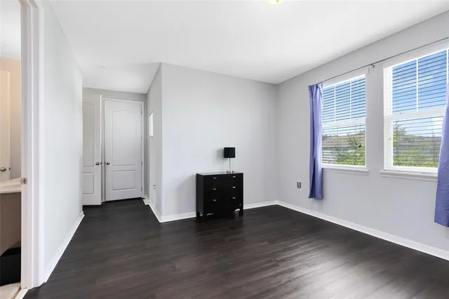 a view of a livingroom with wooden floor