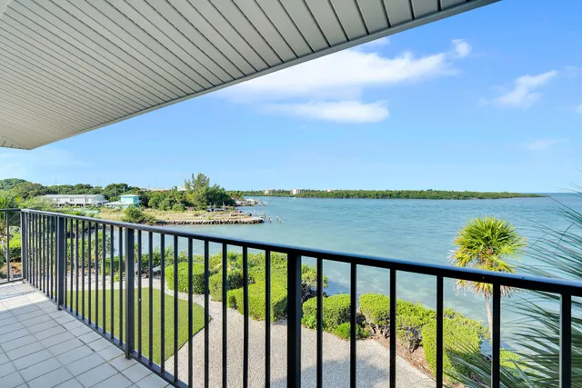 a view of a balcony with lake view