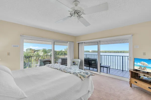 a view of room with window and hallway