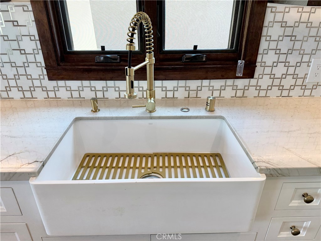 13302 Sandra Place Garden Grove, CA 92843 - Photo 11 of 41 a bathroom with a bathtub and a sink