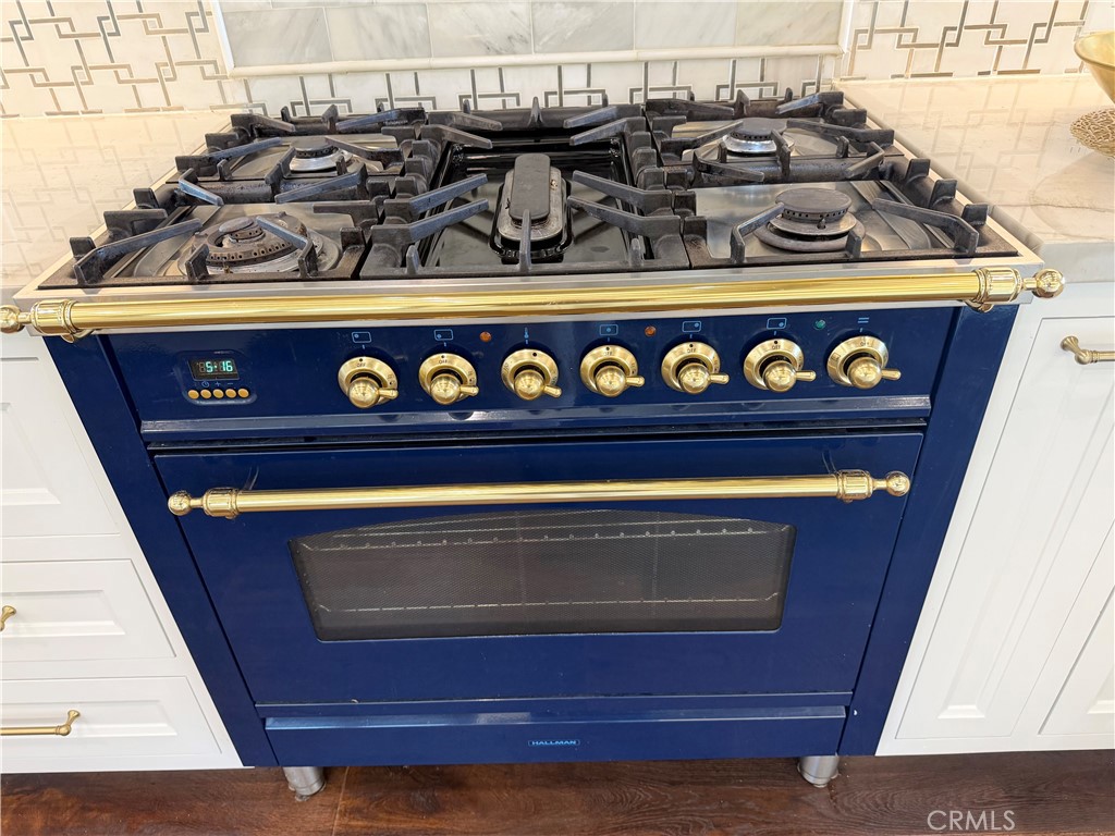 13302 Sandra Place Garden Grove, CA 92843 - Photo 13 of 41 a close view of stove