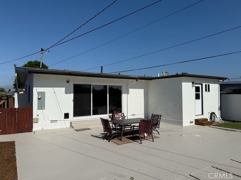 13302 Sandra Place Garden Grove, CA 92843 - Photo 33 of 41 a building outdoor space with patio furniture and potted plants