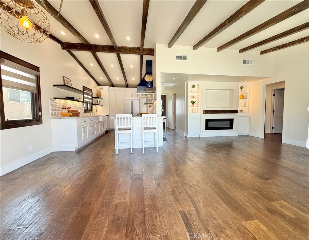 13302 Sandra Place Garden Grove, CA 92843 - Photo 7 of 41 a view of empty room with wooden floor