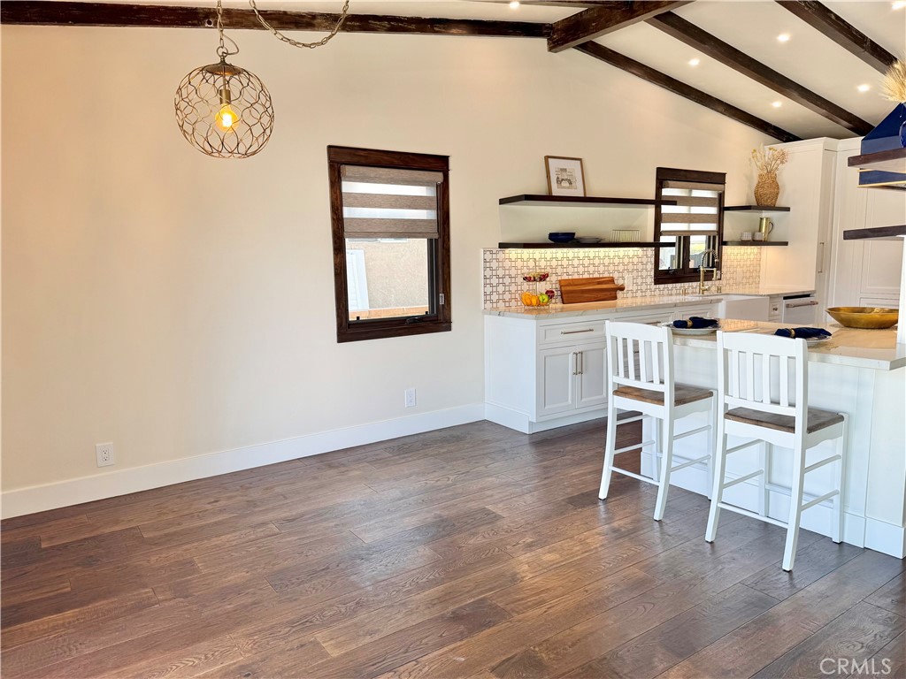 13302 Sandra Place Garden Grove, CA 92843 - Photo 8 of 41 a view of kitchen with furniture and wooden floor