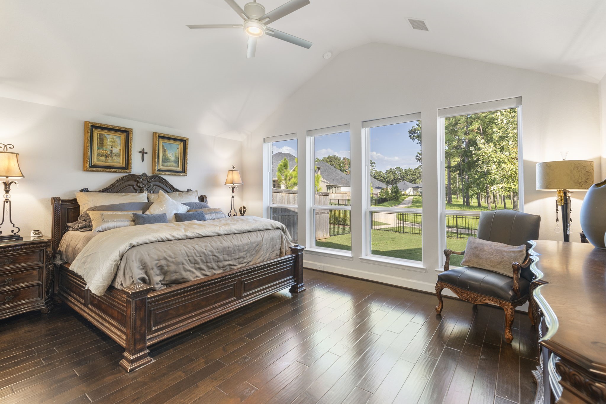 15423 Ringbill Way Magnolia, TX 77354 - Photo 26 of 50 a bedroom with a bed and glass walk in closet