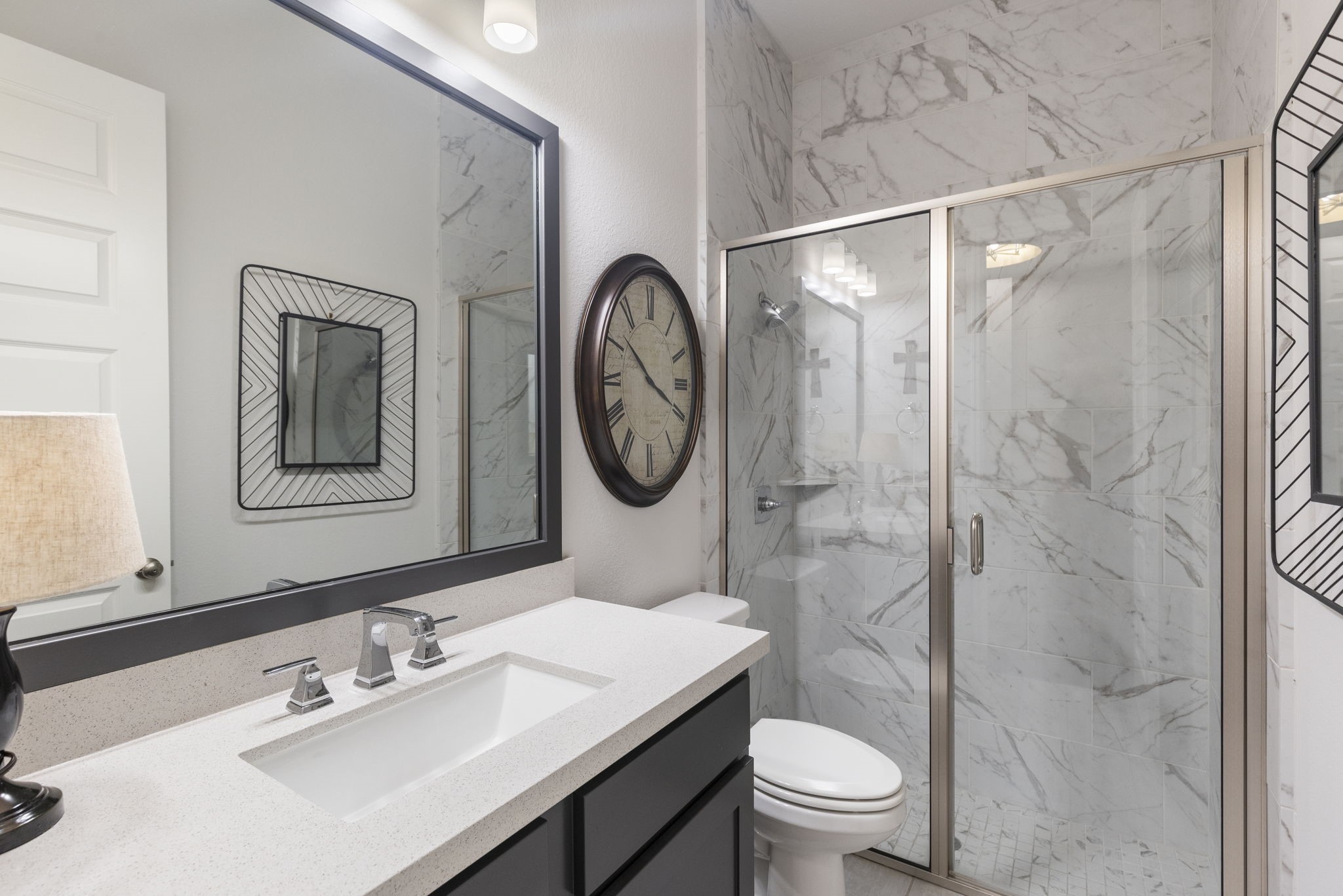 15423 Ringbill Way Magnolia, TX 77354 - Photo 34 of 50 a bathroom with a toilet a sink and a mirror