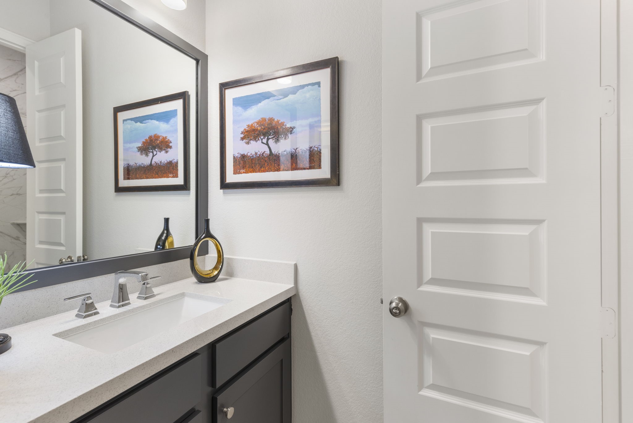 15423 Ringbill Way Magnolia, TX 77354 - Photo 36 of 50 a bathroom with a sink and a mirror