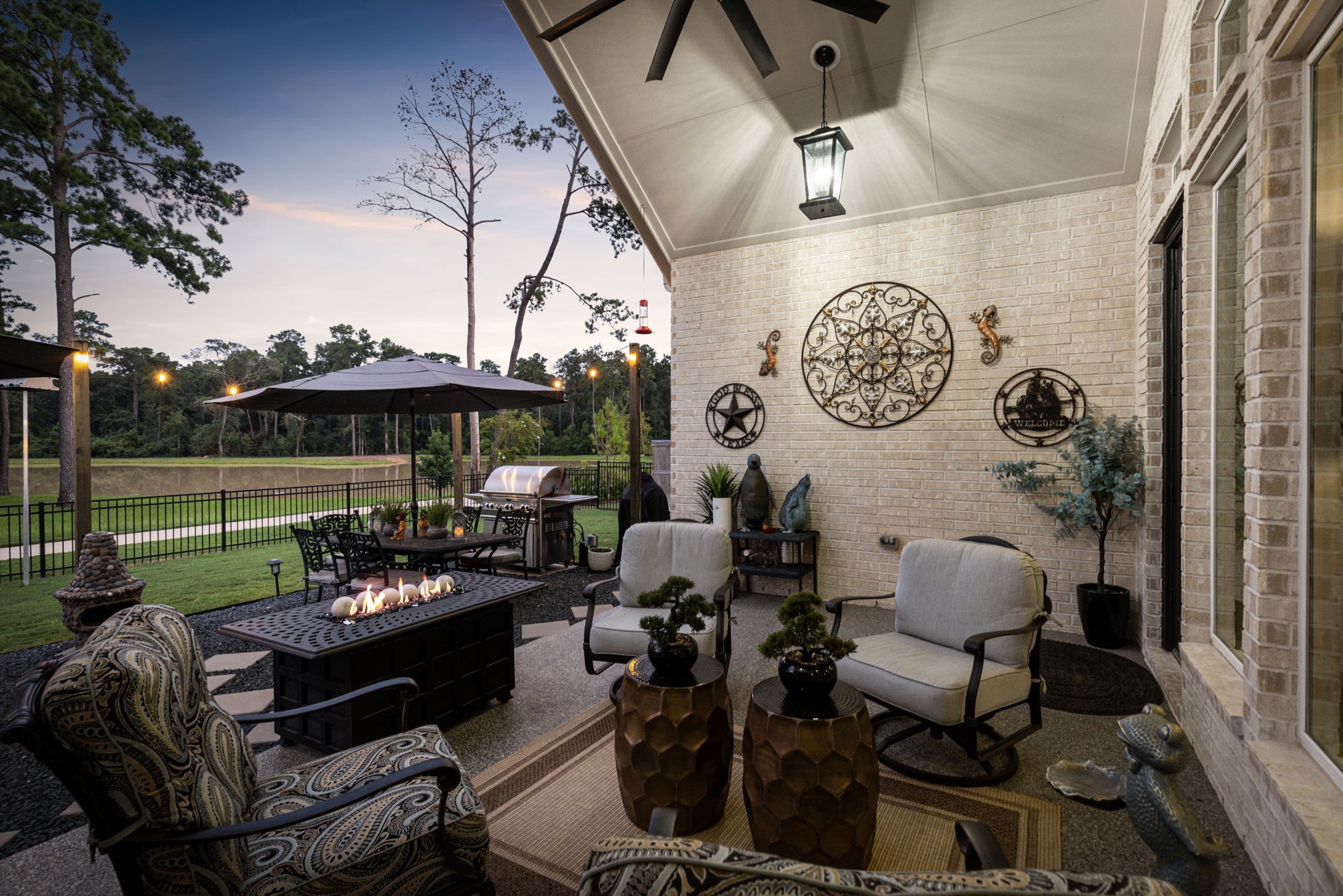 15423 Ringbill Way Magnolia, TX 77354 - Photo 37 of 50 a view of a chairs and tables in backyard of the house