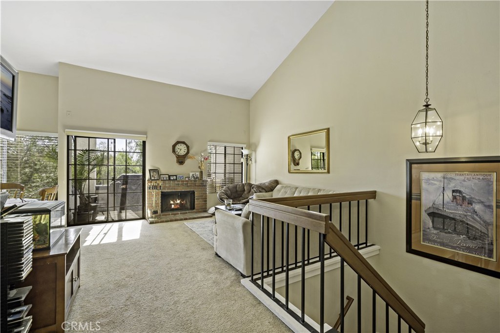 1514 Apache Drive, Unit E Chula Vista, CA 91910 - Photo 11 of 43 a view of a livingroom with furniture fireplace and windows