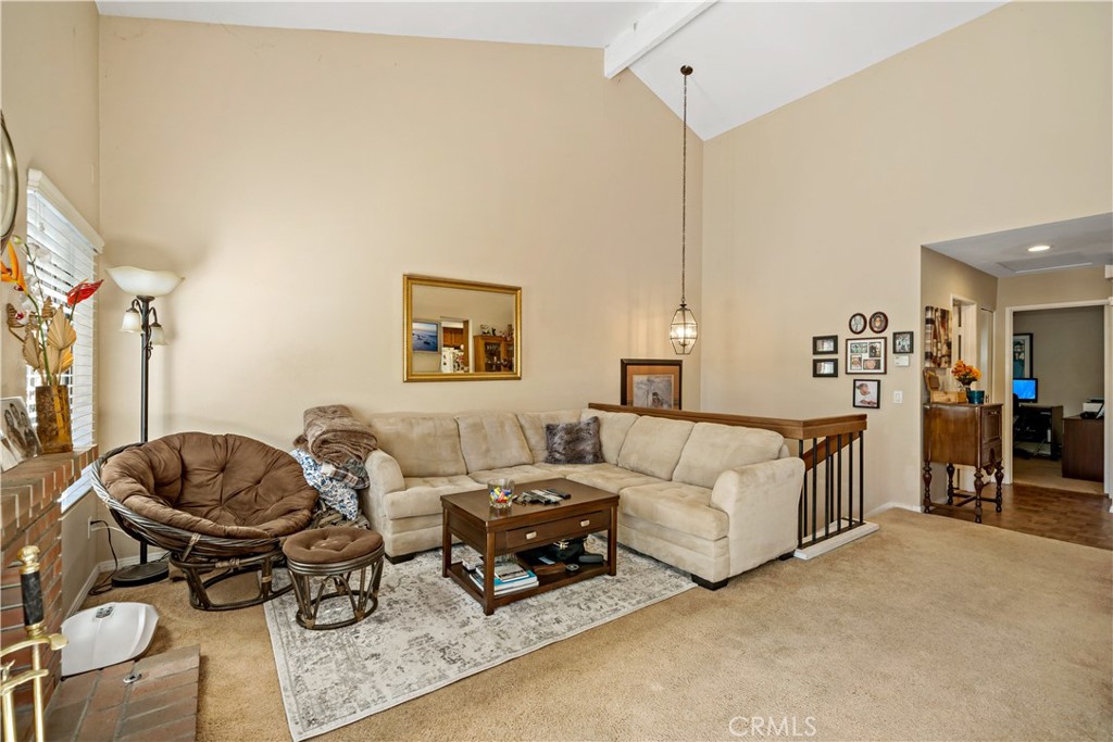 1514 Apache Drive, Unit E Chula Vista, CA 91910 - Photo 15 of 43 a living room with furniture and a chandelier