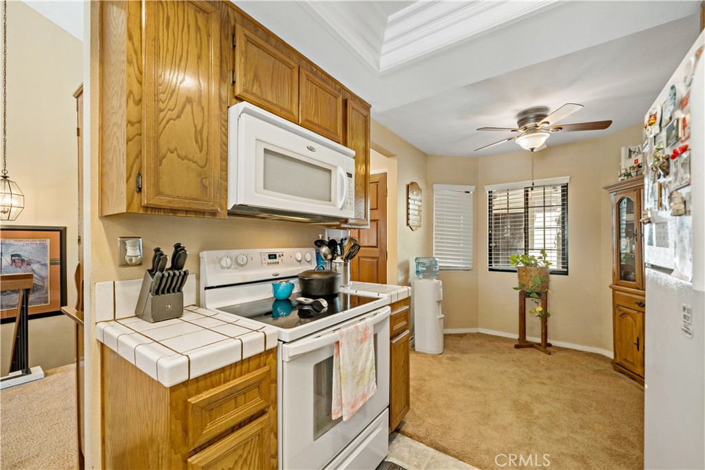 1514 Apache Drive, Unit E Chula Vista, CA 91910 - Photo 20 of 43 a kitchen with a stove and a sink