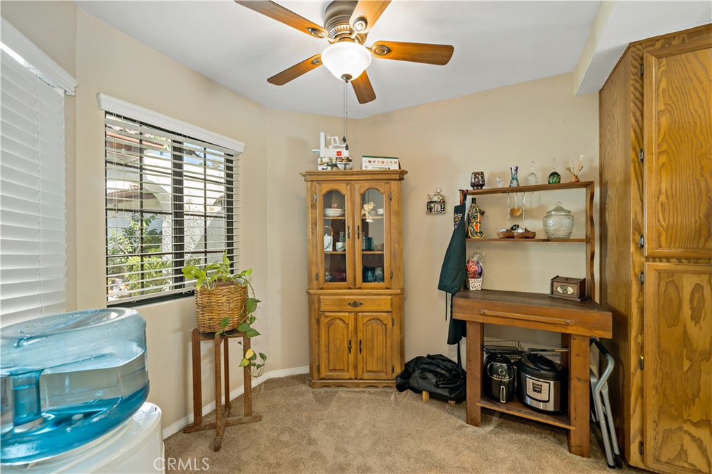 1514 Apache Drive, Unit E Chula Vista, CA 91910 - Photo 21 of 43 a view of a livingroom with furniture and a ceiling fan