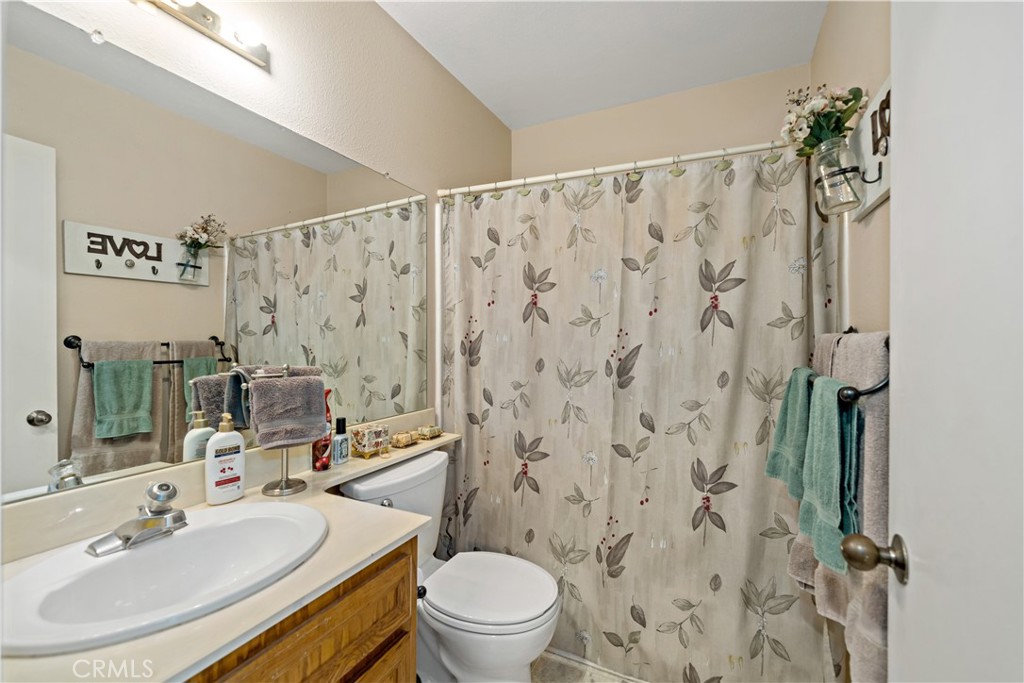 1514 Apache Drive, Unit E Chula Vista, CA 91910 - Photo 24 of 43 a bathroom with a sink toilet and shower