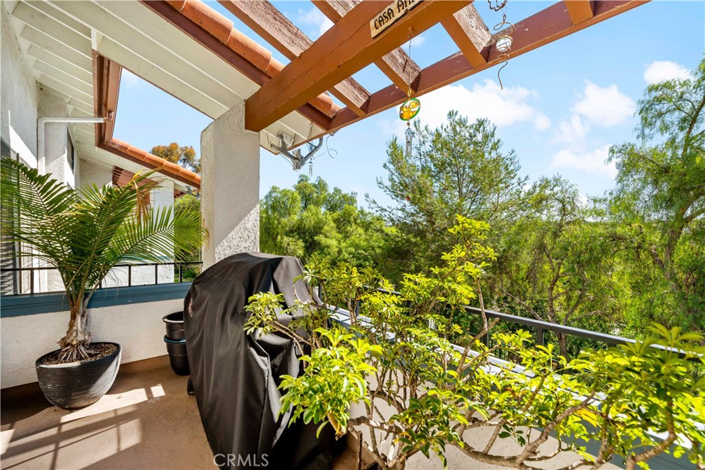 1514 Apache Drive, Unit E Chula Vista, CA 91910 - Photo 26 of 43 a view of a potted plant in front of a house