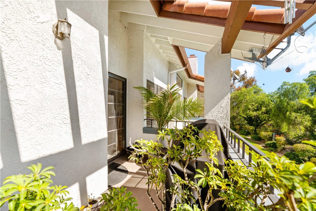 1514 Apache Drive, Unit E Chula Vista, CA 91910 - Photo 27 of 43 a vase of flowers sitting on a floor