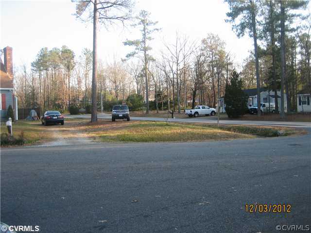 5302 Ridgerun Court Chesterfield, VA 23832 - Photo 13 of 14 a view of street with tall buildings