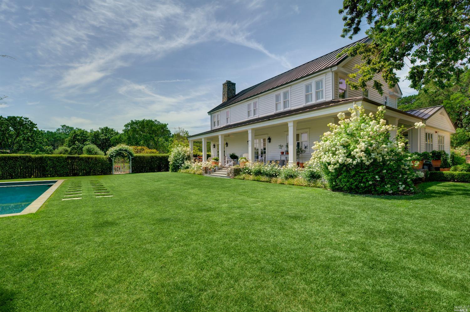 12505 Dunbar Road Glen Ellen, CA 95442 - Photo 1 of 1 a front view of a house with garden