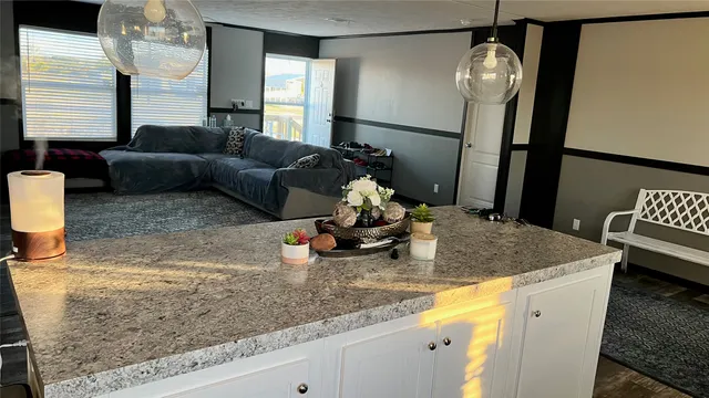 a kitchen with sink and window